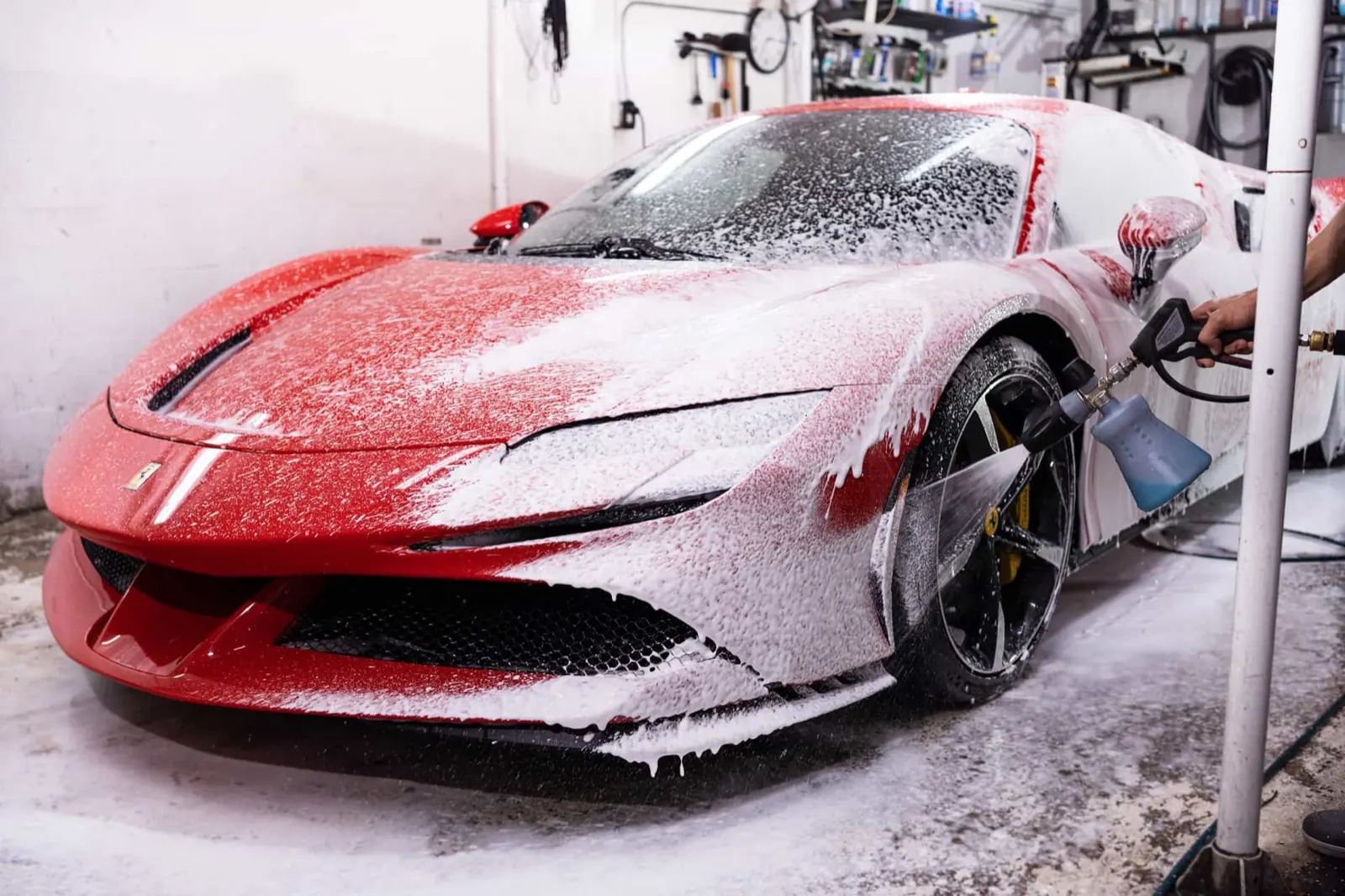 Red Ferrari SF90 after premium finish enhancement