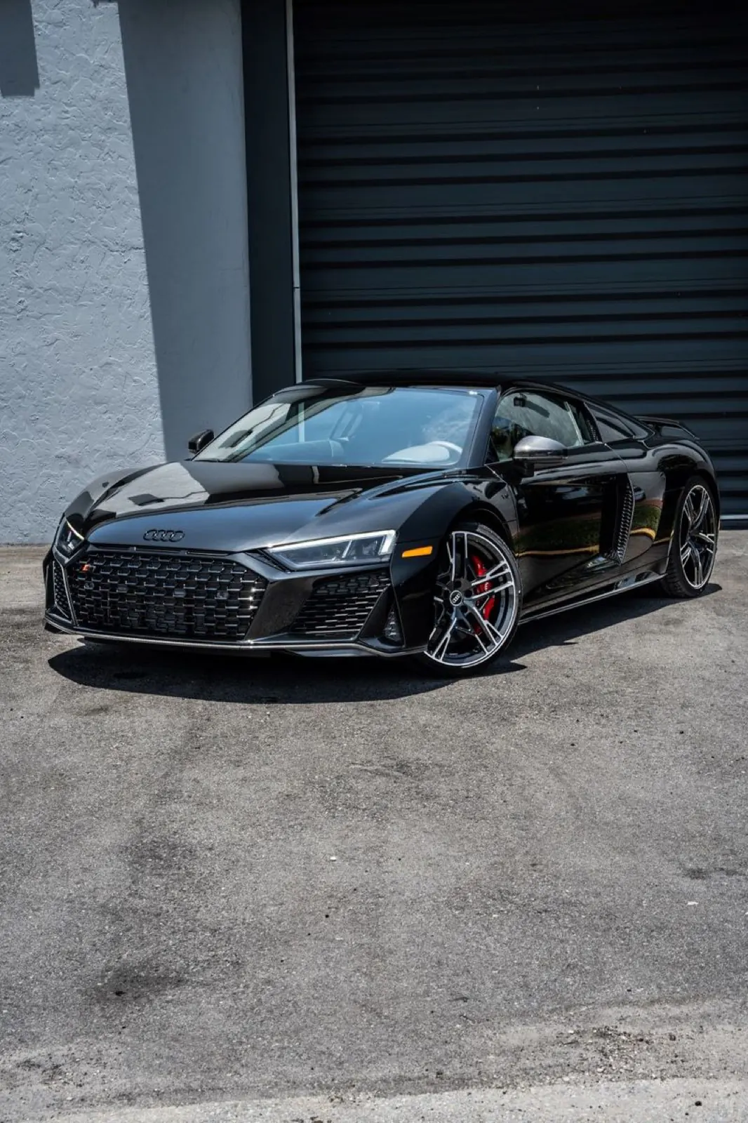 Black Audi R8 front three-quarter view